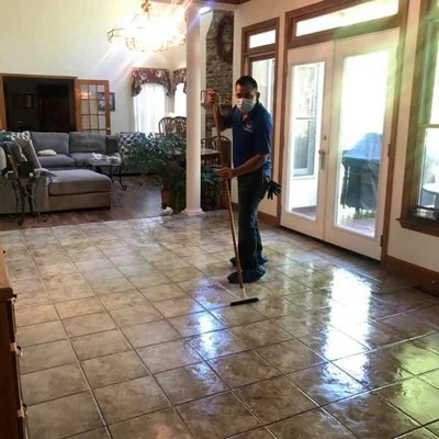 Simitrio Reyes cleaning tile floors professionally